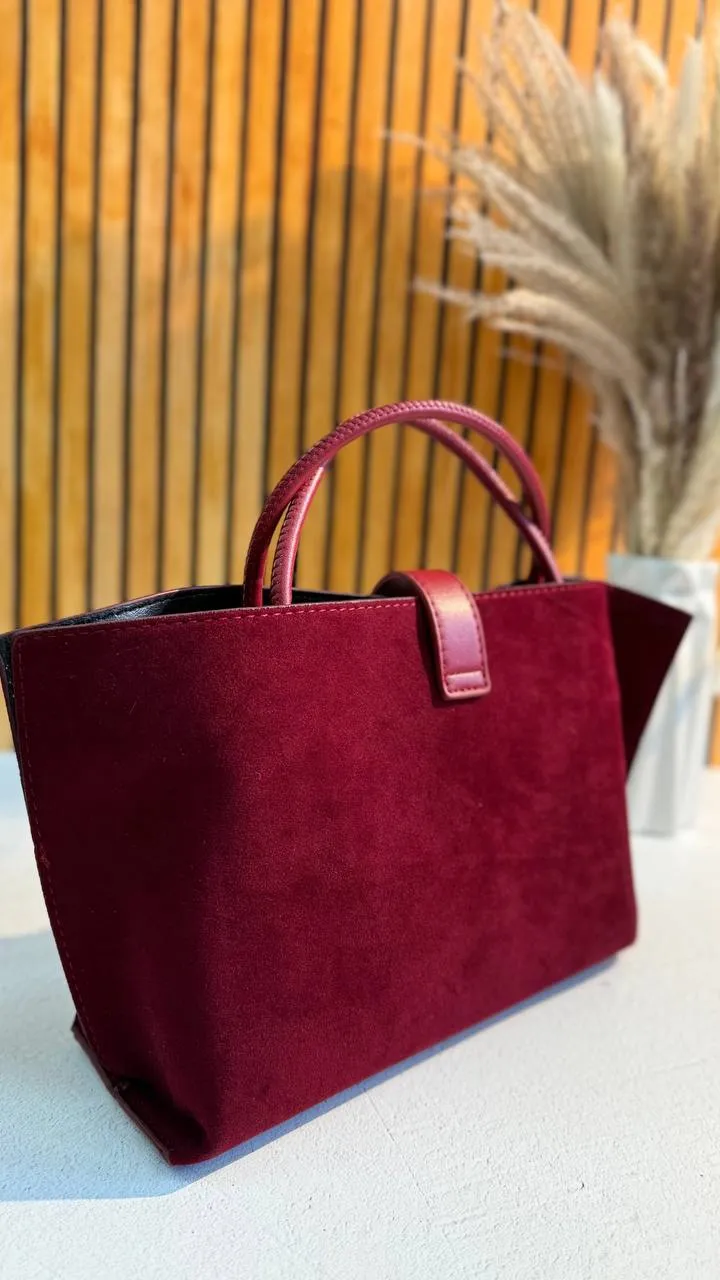 Elegant Suede Handbag with Faux Leather Accents and Detachable Strap