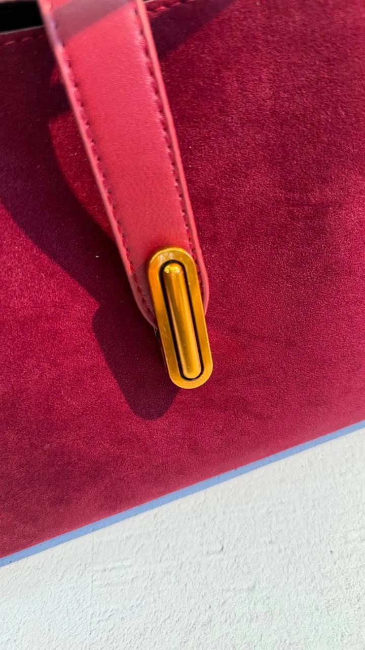 Elegant Suede Handbag with Faux Leather Accents and Detachable Strap