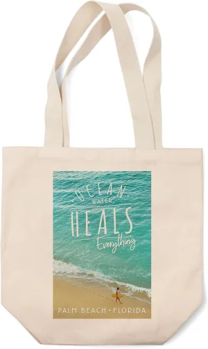 Lantern Press Palm Beach, Florida, Ocean Water Heals Everything, Surfer Walking on Beach (100% Cotton Canvas Reusable Tote Bag)