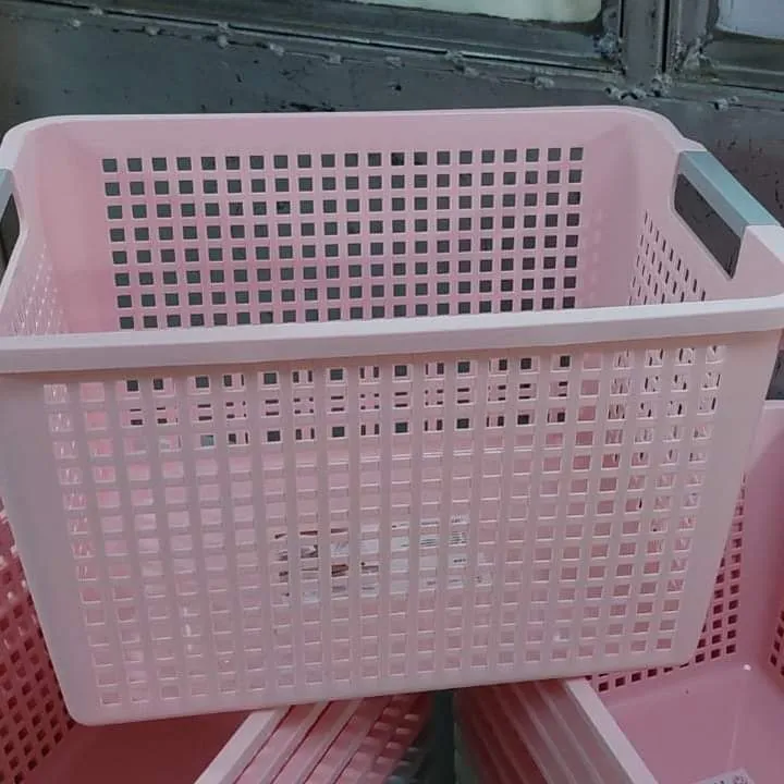 Stackable plastic storage baskets